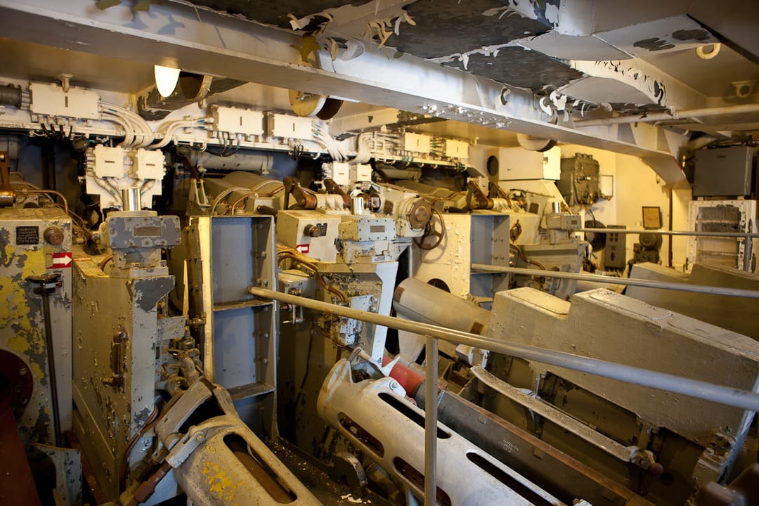 The automated ammunition-handling machinery behind the 8-inch gun turret, aboard USS Salem.