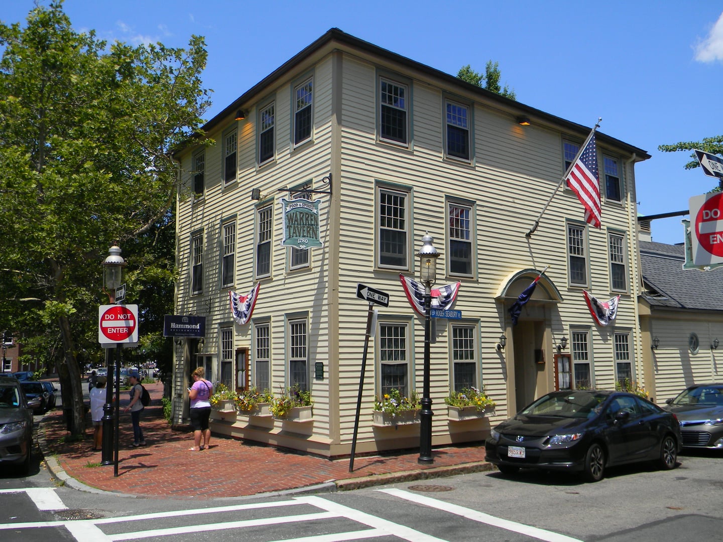 Exterior of Warren Tavern at 2 Pleasant Street in Charlestown, Massachusetts, showing the historic white clapboard building