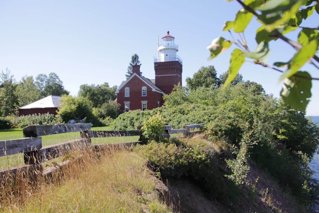 Big Bay Point Lighthouse brick light station and keepers quarters in Marquette County Michigan