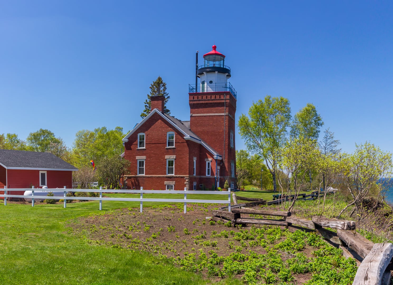 Big Bay Point Lighthouse brick light station and keepers quarters in Marquette County Michigan