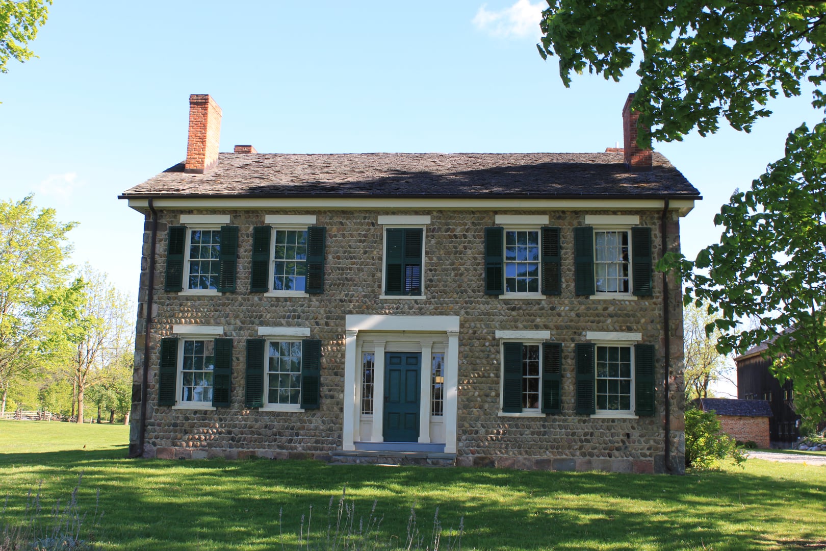The 1844 Ticknor-Campbell cobblestone farmhouse at Cobblestone Farm, built by naval surgeon Dr. Benajah Ticknor, Ann Arbor, Michigan