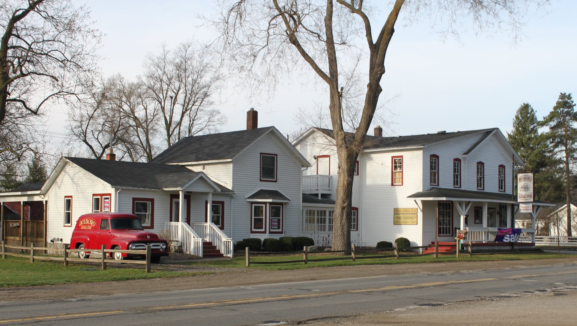 The white wood-frame Dixboro General Store building at the Plymouth Road and Cherry Hill Road crossroads in Dixboro, Michigan