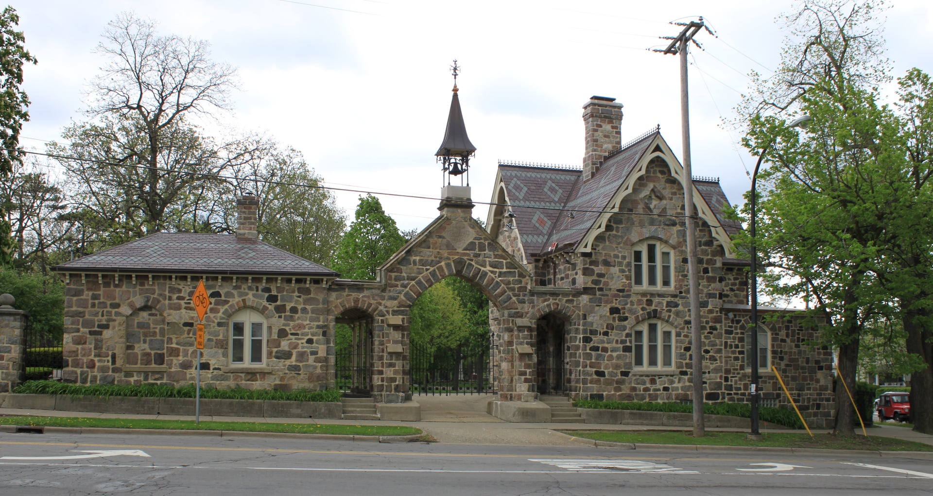 Stone entrance gateway to Forest Hill Cemetery at 415 S. Observatory Street, a 65-acre rural-style cemetery established 1856, Ann Arbor, Michigan