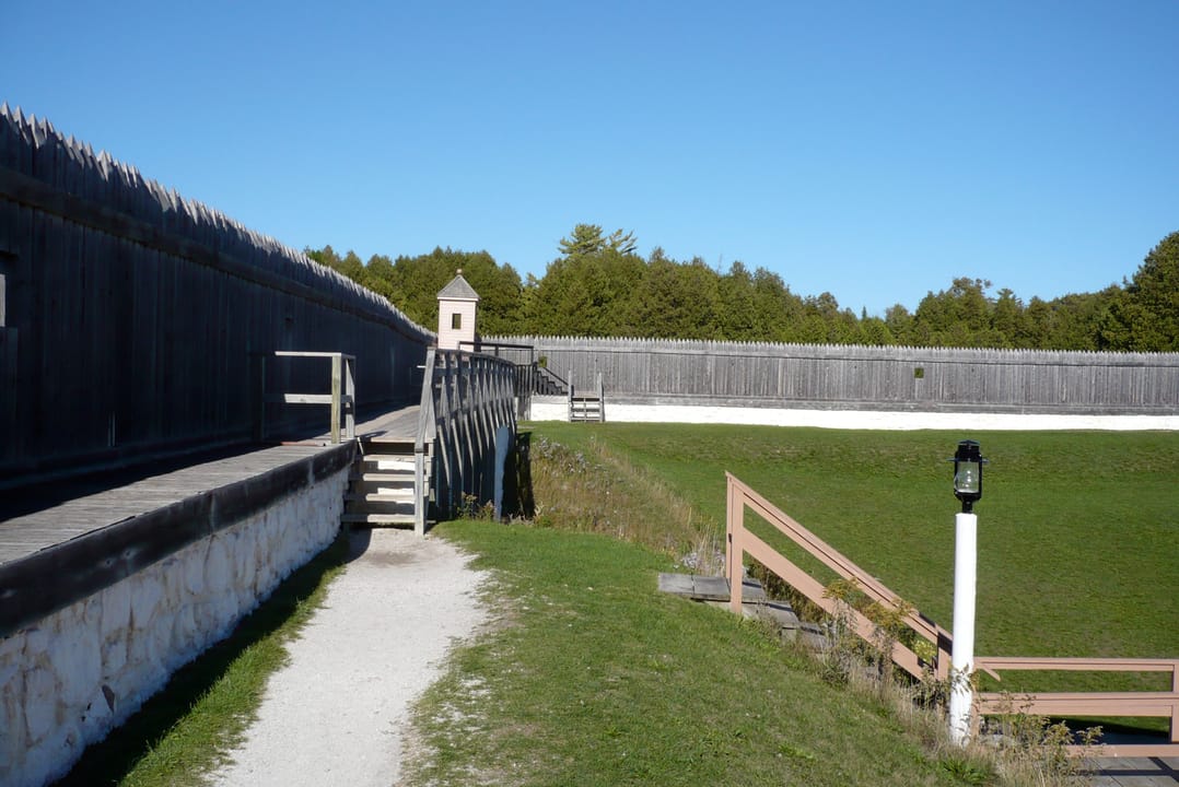 Inside the fort: the wooden palisade walkway and whitewashed ramparts open to visitors, Fort Mackinac, 2007.