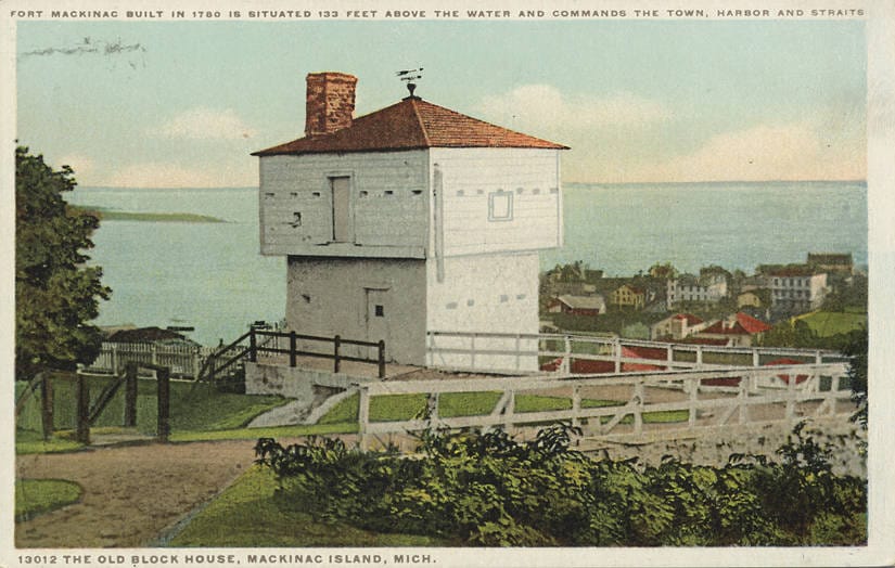 Vintage hand-tinted postcard of the Old Block House at Fort Mackinac, captioned "Fort Mackinac built in 1780 is situated 133 feet above the water and commands the town, harbor and straits."