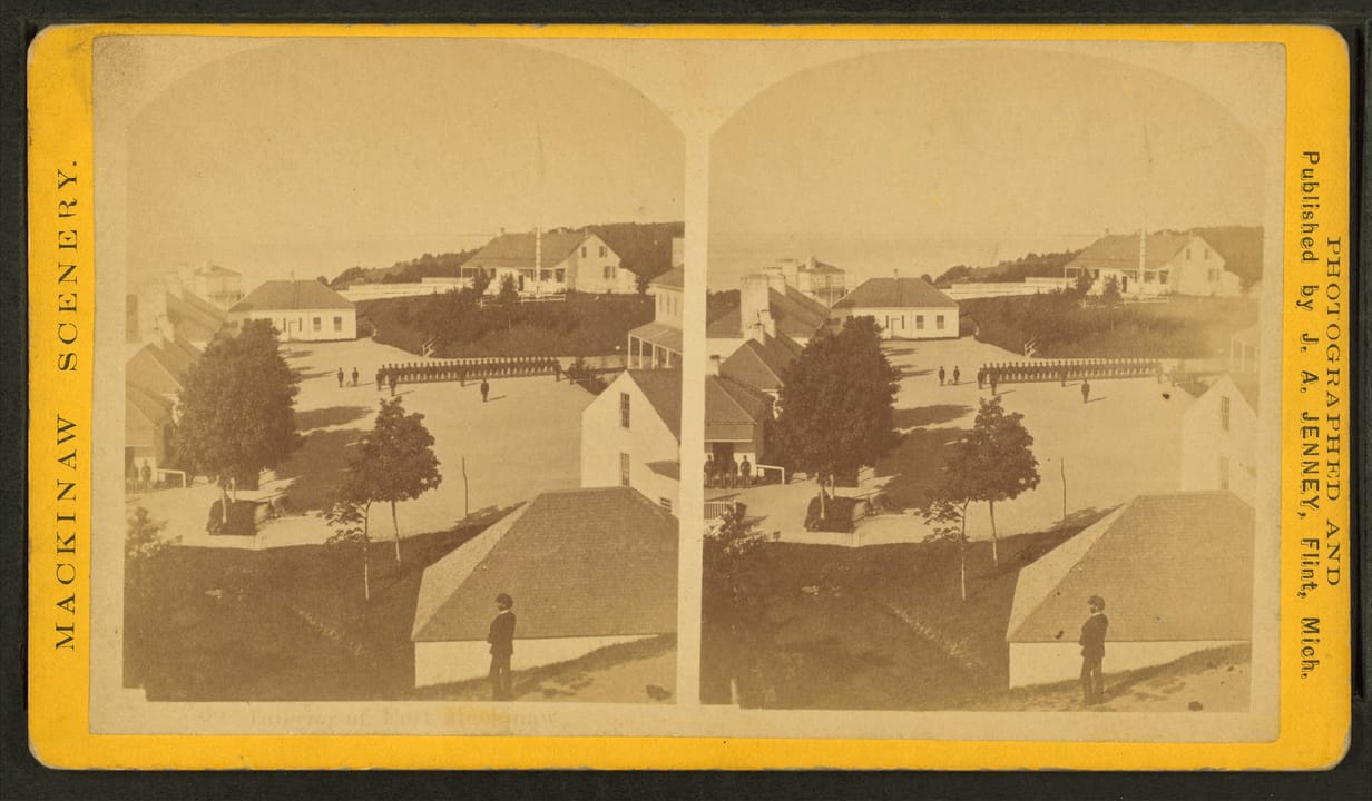 19th-century stereoview card "Mackinaw Scenery," published by J. A. Jenney of Flint, Michigan, showing the interior grounds and buildings of Fort Mackinac.