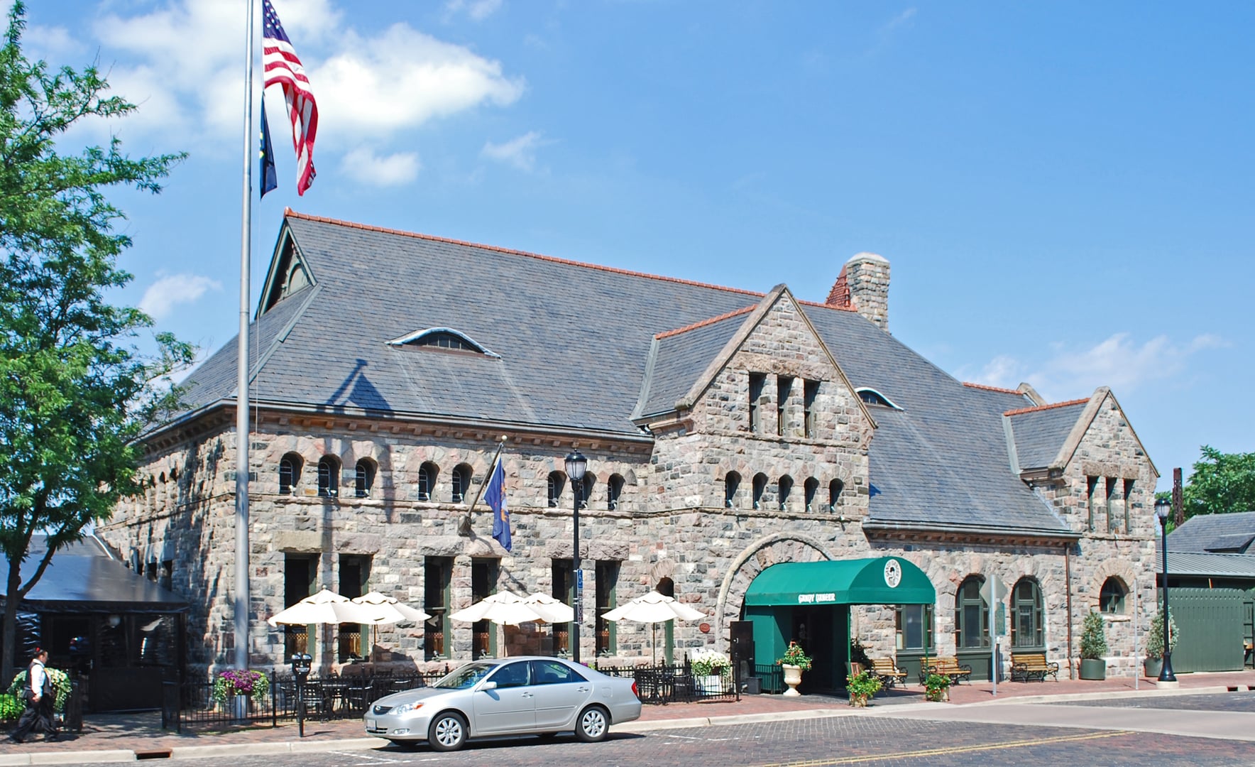 Richardsonian Romanesque exterior of the 1886 Michigan Central Railroad Depot designed by Spier & Rohns, now the Gandy Dancer Restaurant, Ann Arbor, Michigan