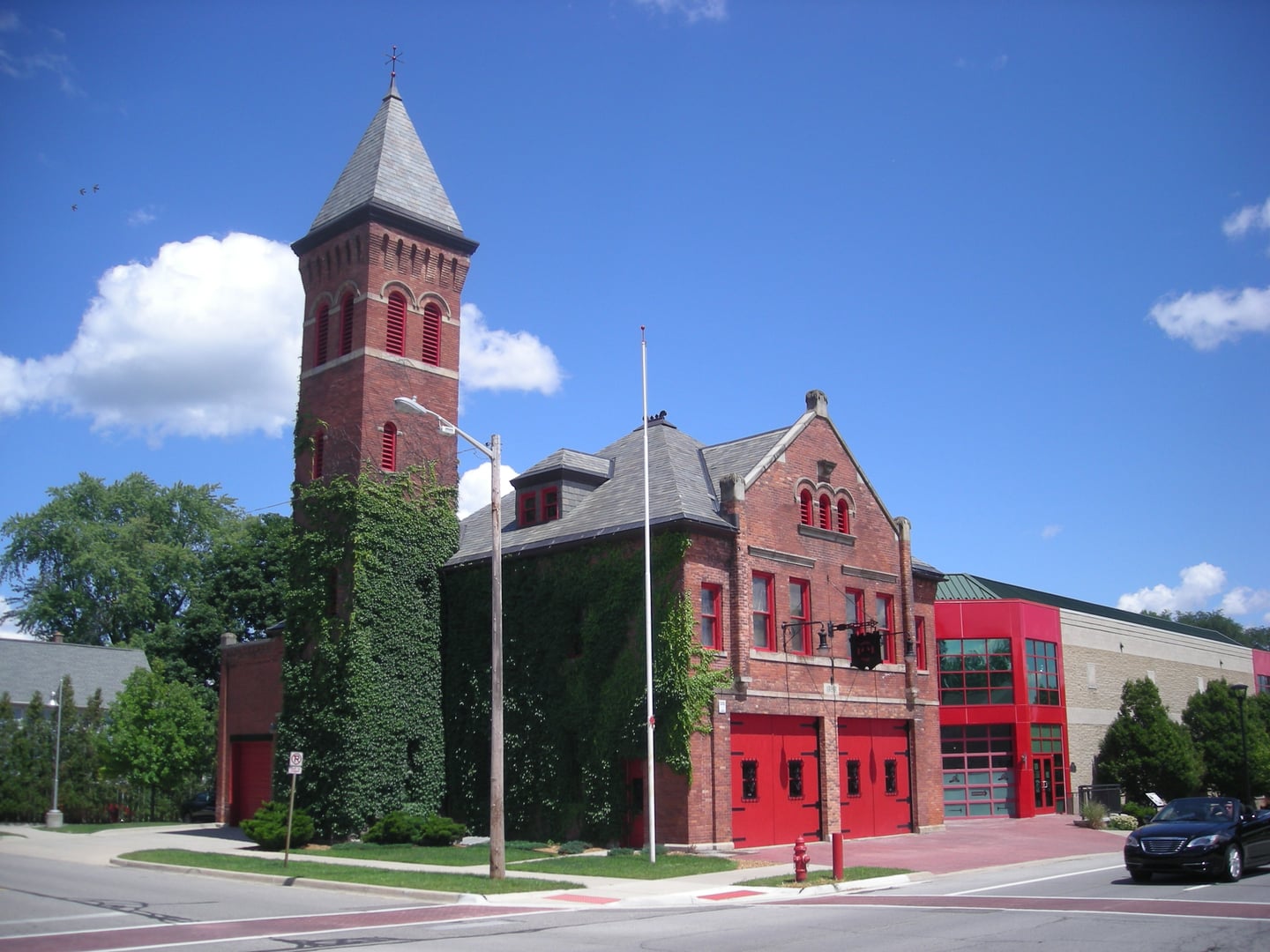 The brick exterior of the Michigan Firehouse Museum, a former 1898 fire station in Ypsilanti, Michigan