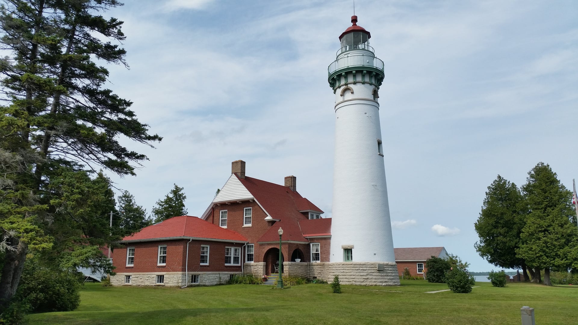 Seul Choix Point Lighthouse, an 1895 white brick tower on Lake Michigan's Upper Peninsula shore in Gulliver, Michigan