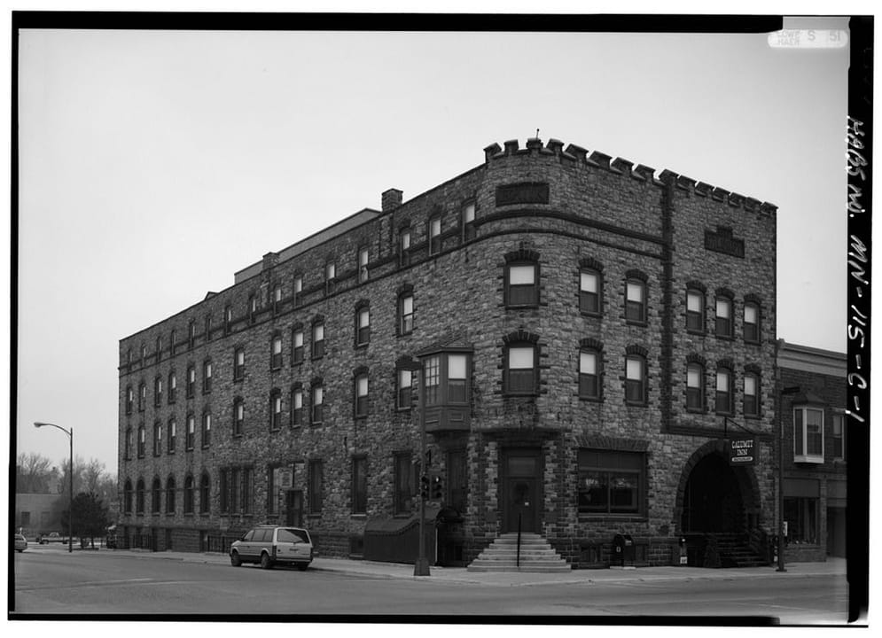 Exterior of the Historic Calumet Inn in Pipestone, Minnesota, showing pink Sioux quartzite facade