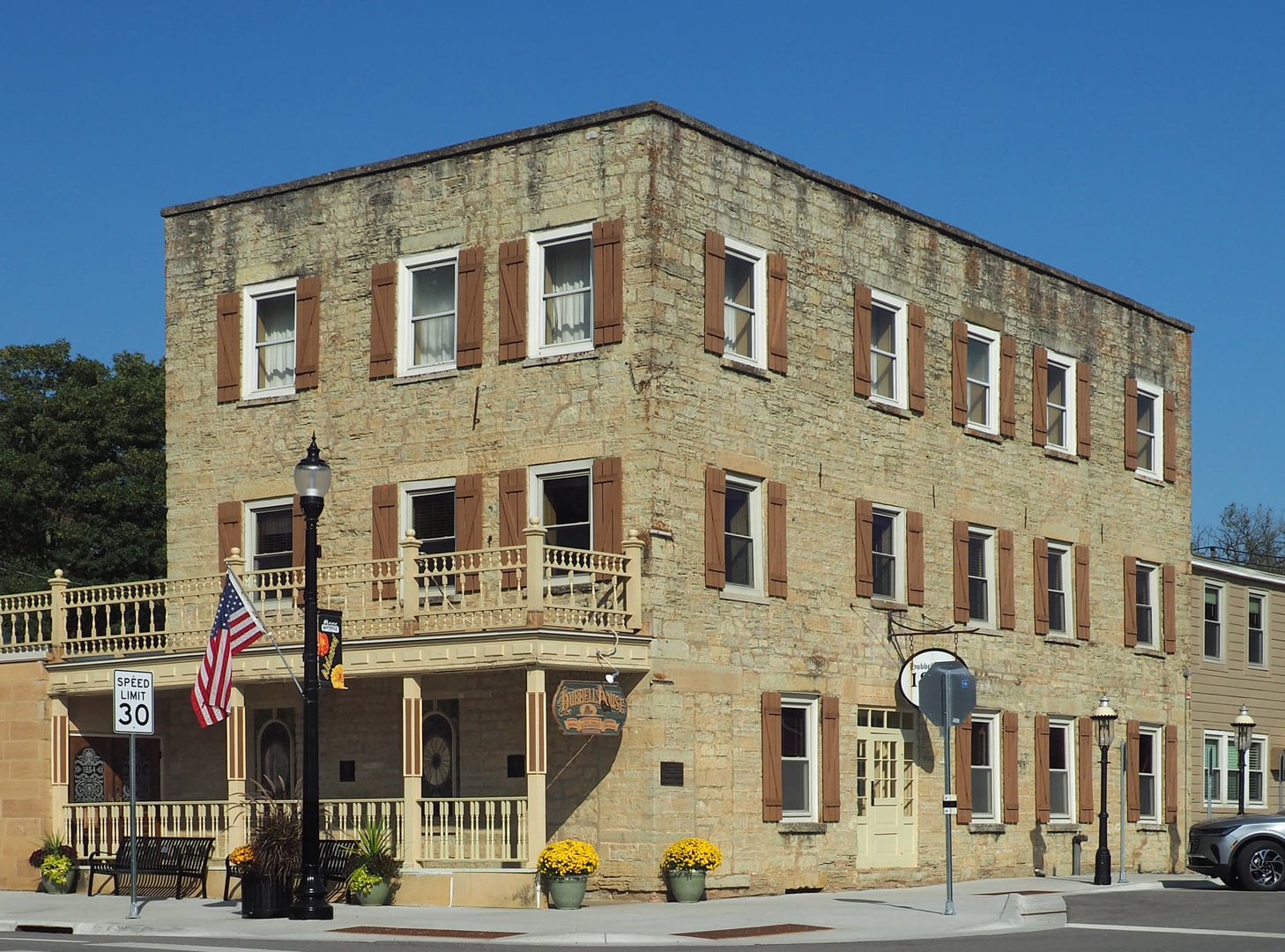 The limestone exterior of the Hubbell House restaurant at 502 N Main St in Mantorville, Minnesota, photographed in 2025