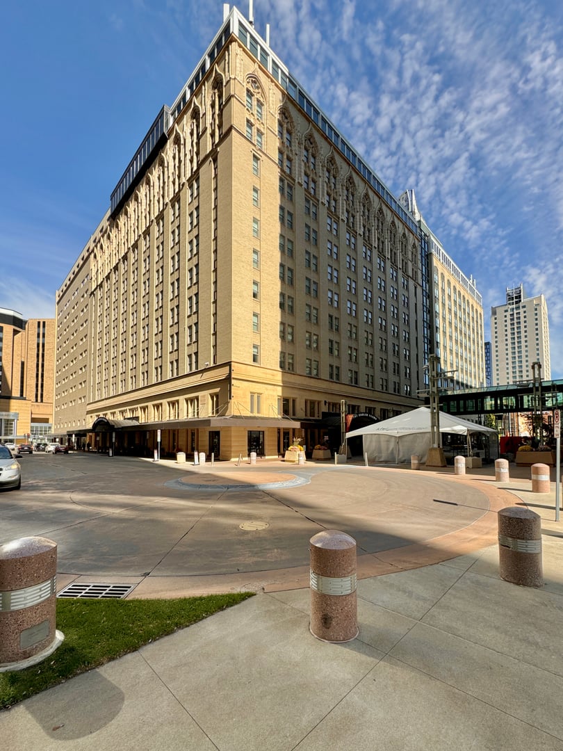Exterior of the Kahler Grand Hotel at 2nd Avenue SW and 1st Street SW in Rochester, Minnesota, showing the 1921 Gothic Revival buff brick facade