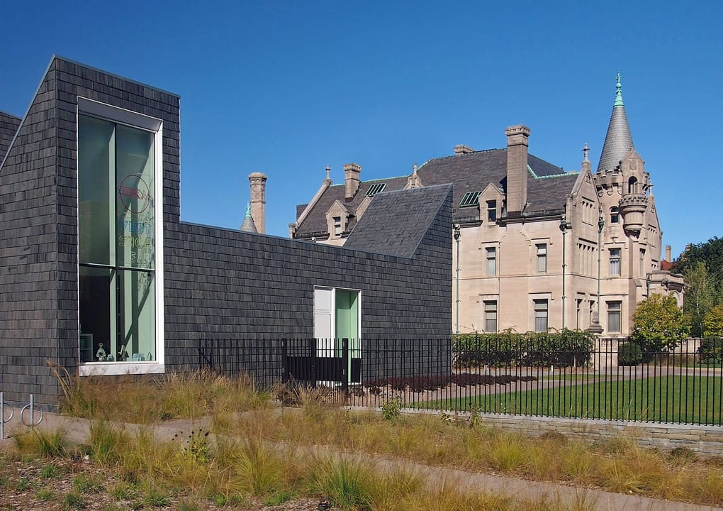 The Turnblad Mansion (right) beside the Institute's modern Nelson Cultural Center addition (left), viewed from the southeast, 2600 Park Ave, Minneapolis.