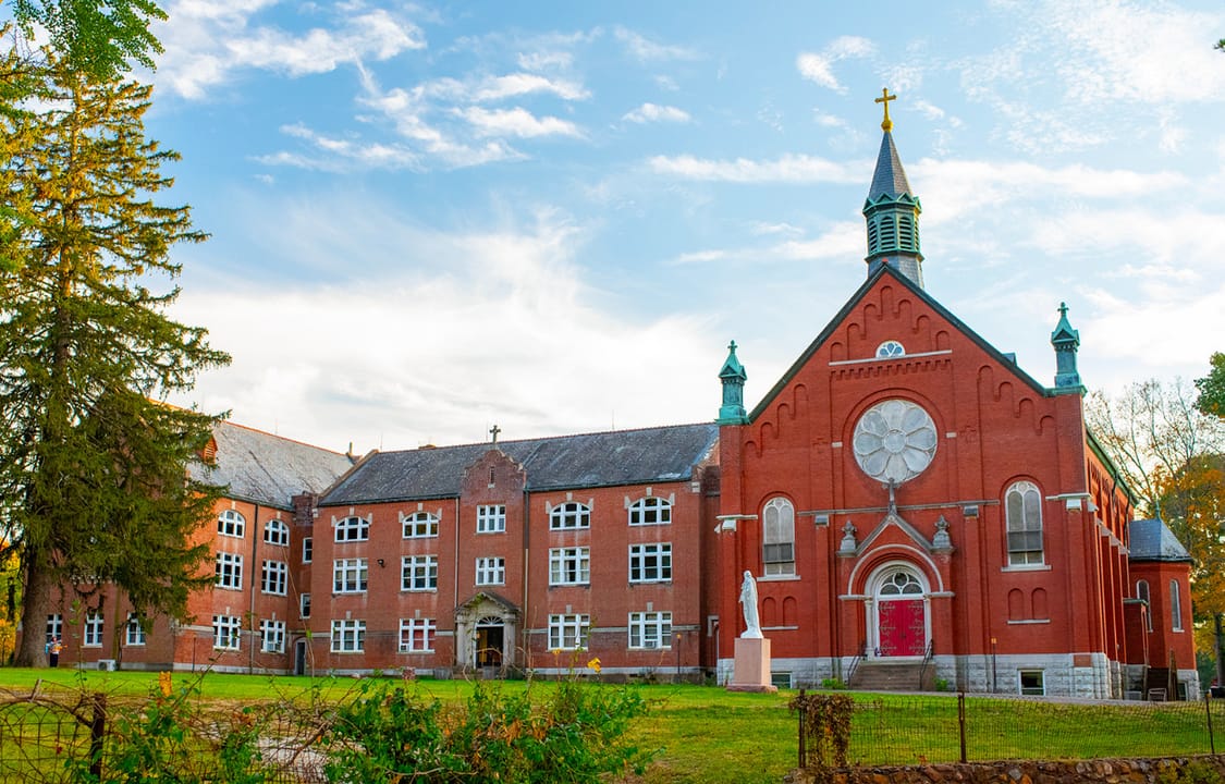 Historic campus buildings of Arcadia Academy in Arcadia, Missouri, including church and dormitory structures dating to 1840