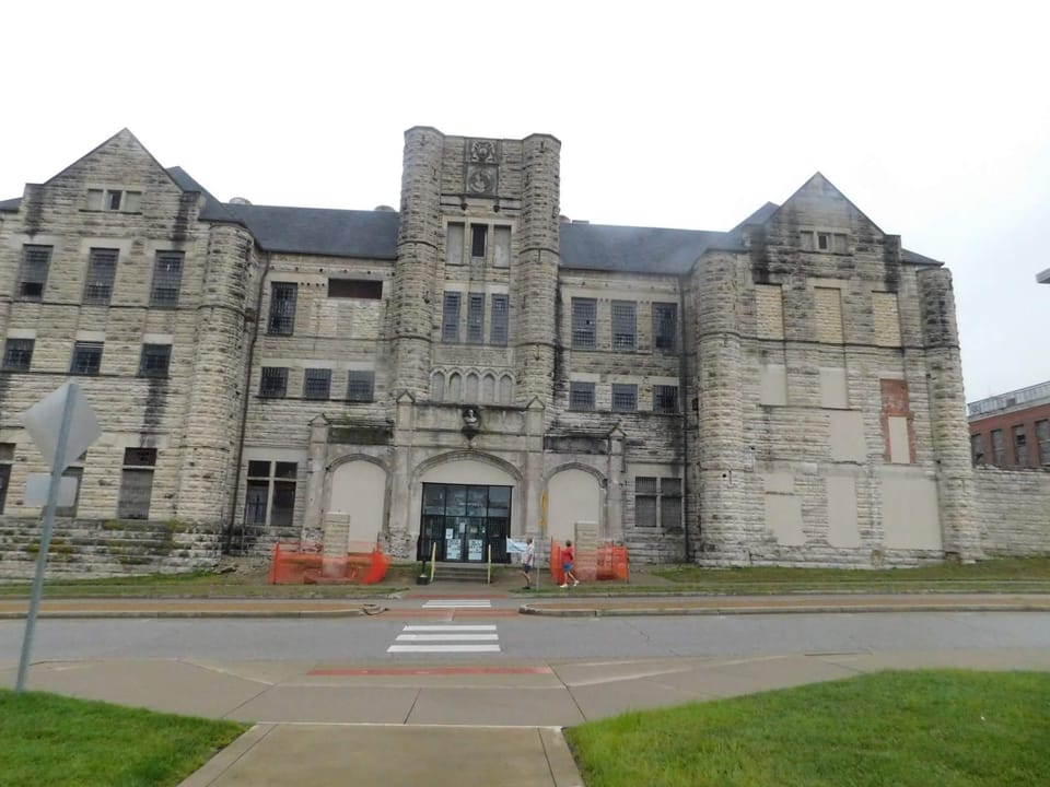 The Missouri State Penitentiary's gatehouse seen across the street from the public sidewalk, Jefferson City, Missouri, 2018.