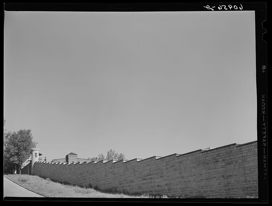 The Missouri State Penitentiary's perimeter wall, photographed by John Vachon for the Farm Security Administration, May 1940.