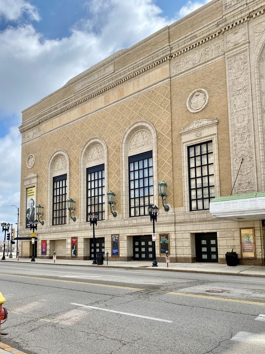 Full daytime street view of Powell Hall's Grand Boulevard facade, Grand Center Arts District, St. Louis.