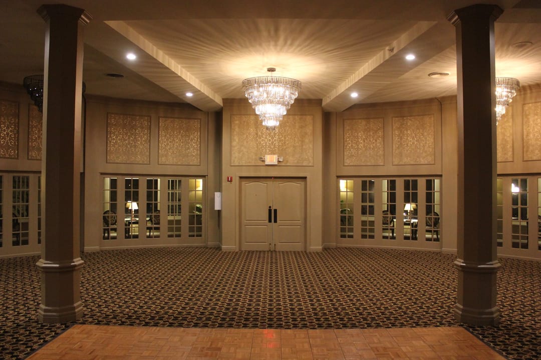 The Elms Hotel's Grand Ballroom, with its columned entrance and crystal chandeliers, Excelsior Springs, Missouri.