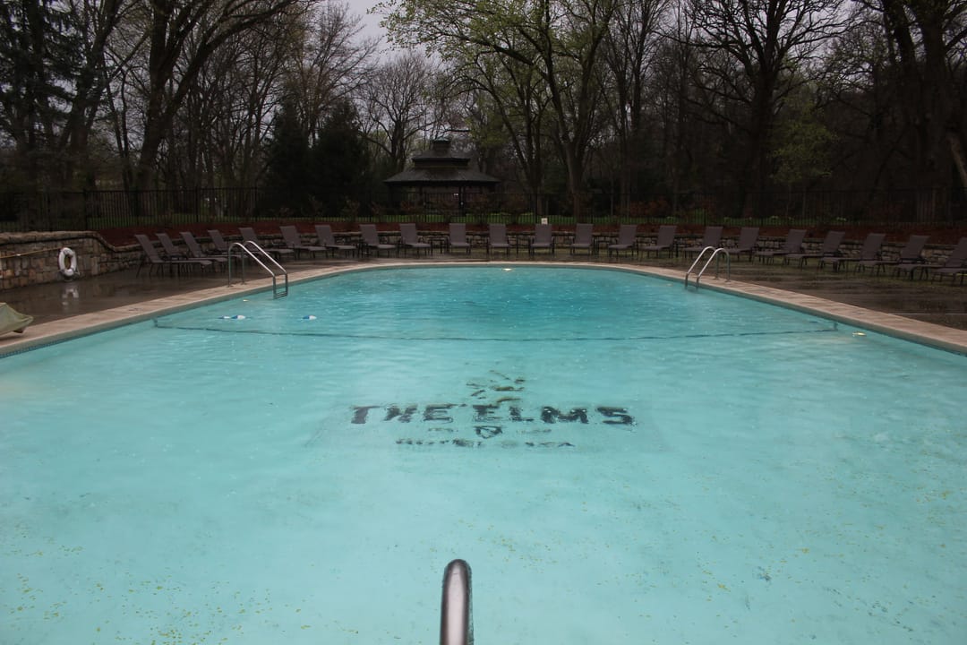 The Elms Hotel's outdoor pool, with 'THE ELMS' lettered on the pool floor, Excelsior Springs, Missouri.