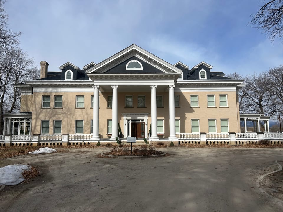 Daly Mansion's columned front facade in late winter, Hamilton, Montana, March 2025.