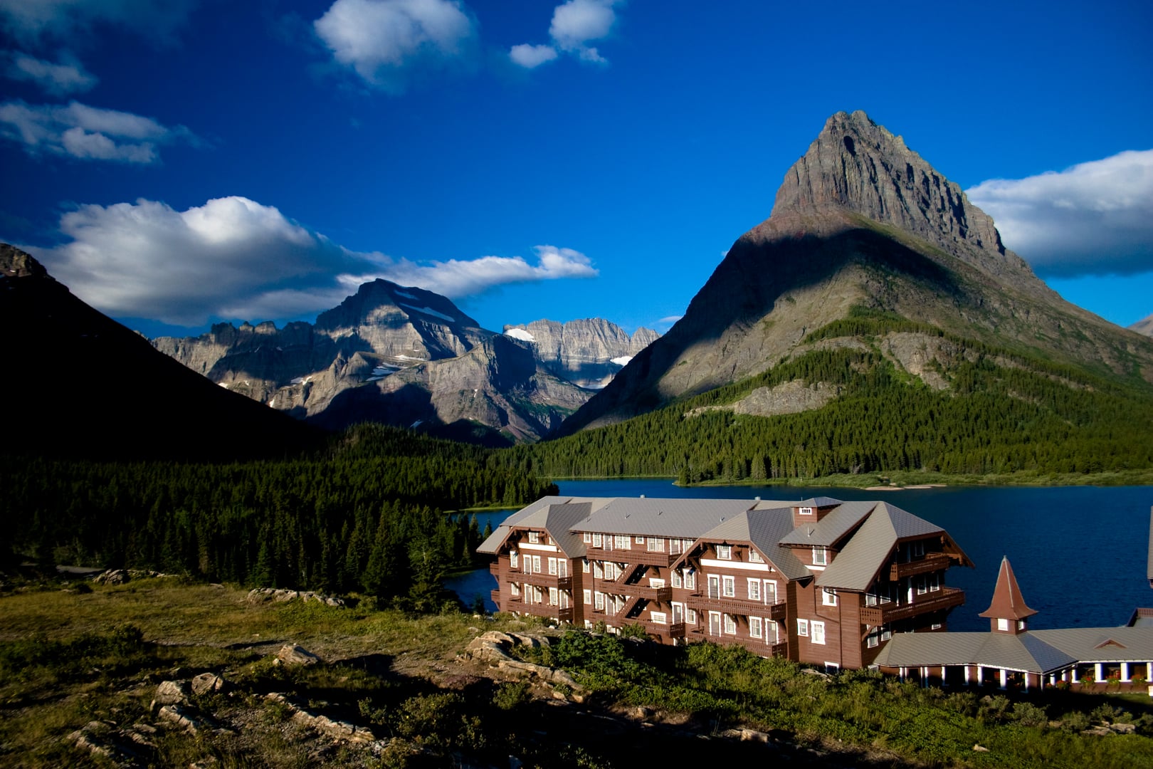 Many Glacier Hotel's Swiss-chalet exterior on the shore of Swiftcurrent Lake in Glacier National Park
