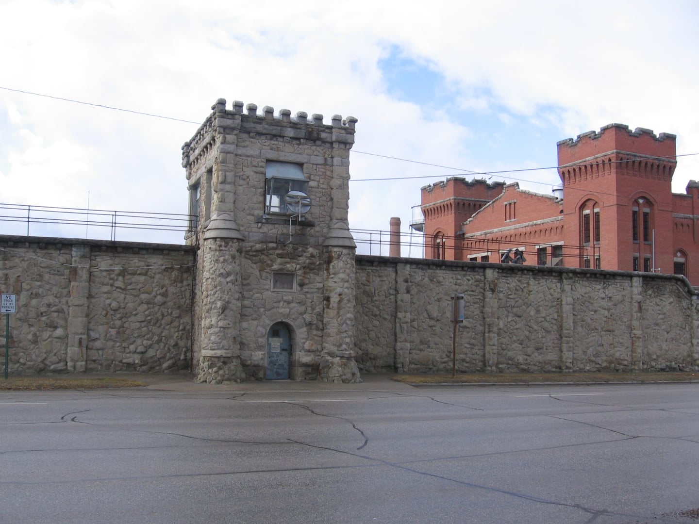 Stone-walled main entrance of the Old Montana Prison in Deer Lodge, Montana