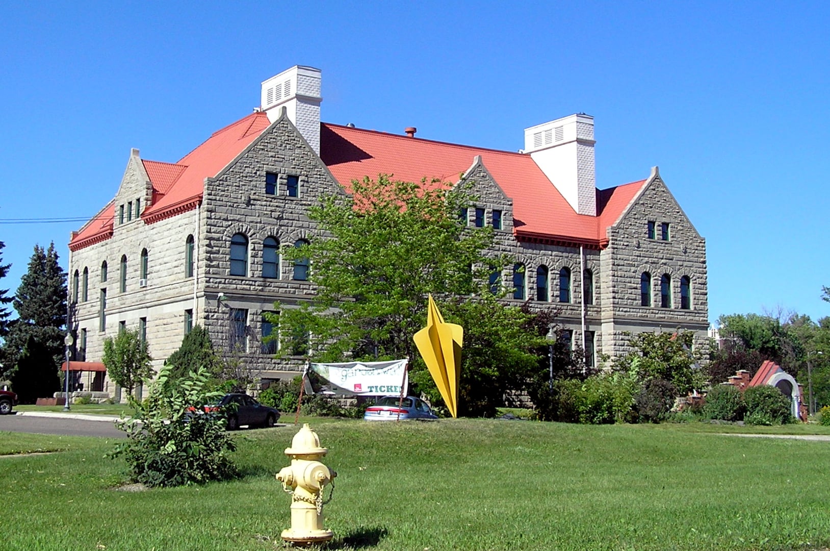 Romanesque Revival stone building, the Paris Gibson Square Museum of Art, formerly Great Falls High School