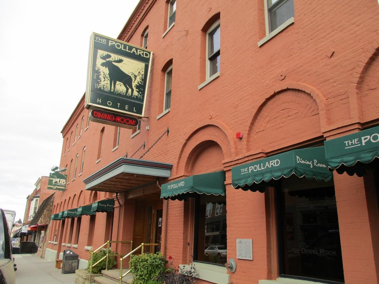 Brick Victorian-era hotel facade with arched ground-floor windows in downtown Red Lodge, Montana
