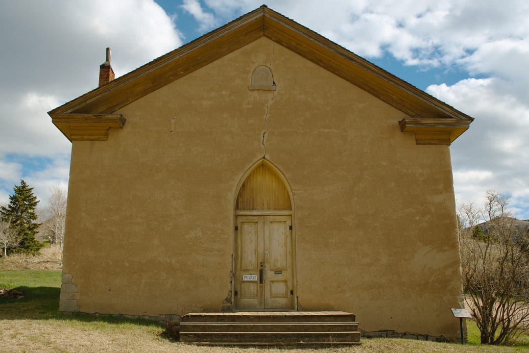 The historic Methodist Church on West Idaho Street in the Virginia City Historic District, a simple gable-front adobe/frame church.