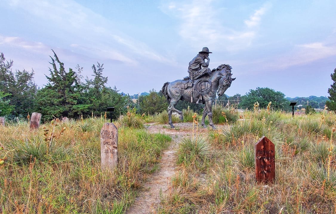 Boot Hill Ogallala Nebraska statue and grave markers