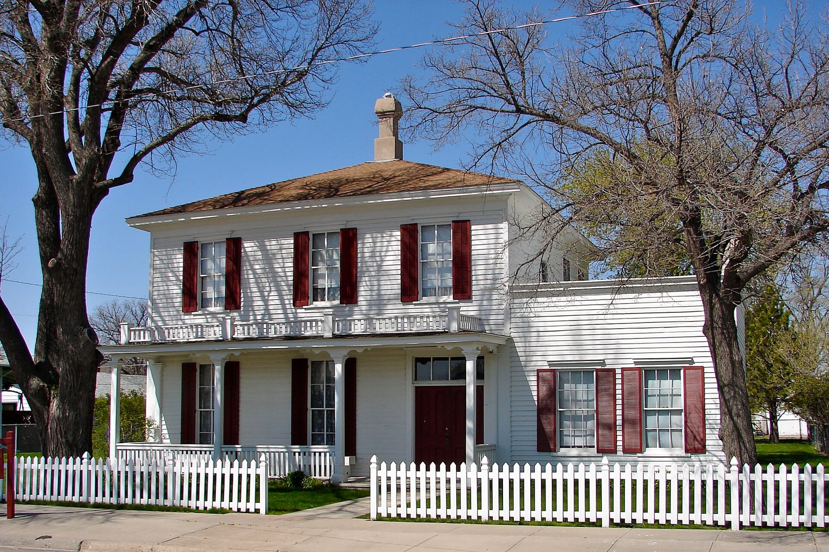 The commander's quarters at Fort Sidney Historic District in Sidney, Nebraska — a two-story frame residence from the 1870s frontier army post, listed on the National Register of Historic Places