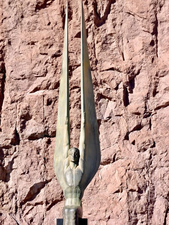 One of the bronze Winged Figures of the Republic at the Hoover Dam dedication plaza on the Nevada rim.