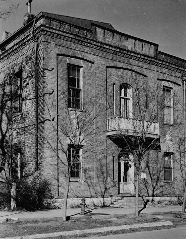 Historic photograph of the Old Lincoln County Courthouse in Pioche, Nevada, showing Italianate architecture