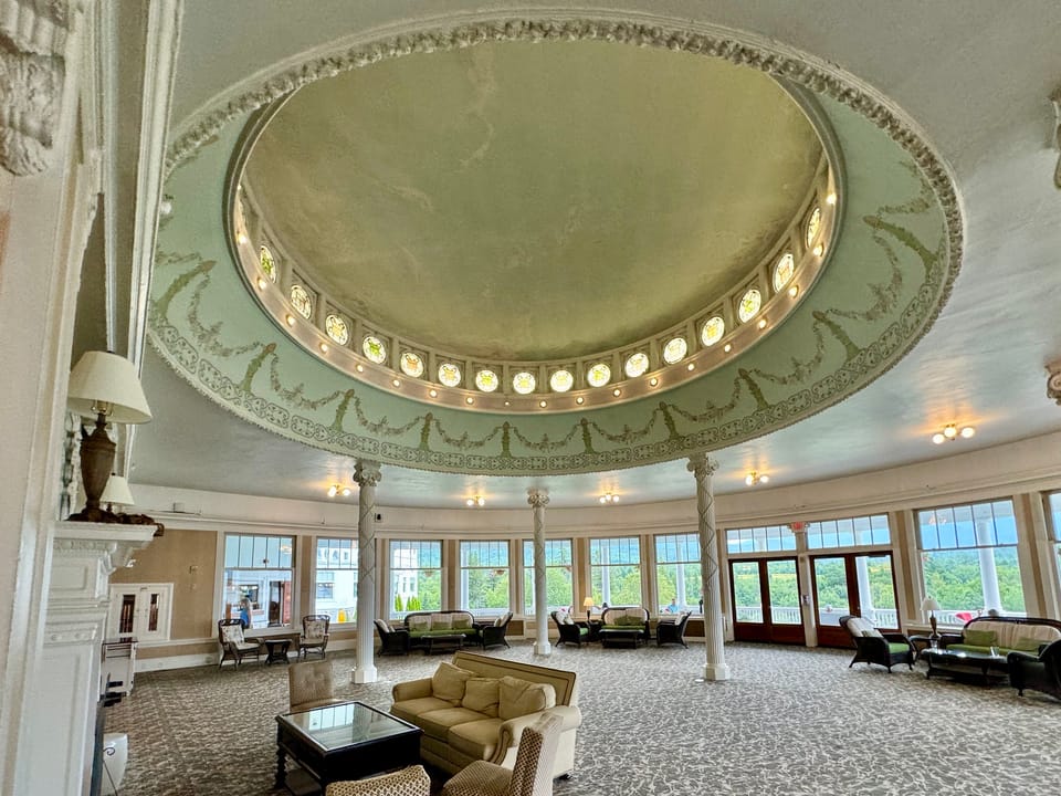 The hotel's oval lounge with its domed, coffered ceiling and ring of lights, Bretton Woods, NH.