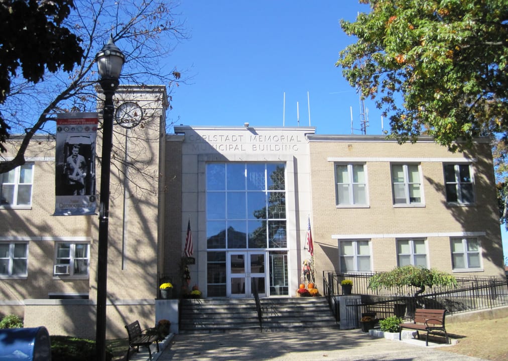 Photo of the Carlstadt Memorial Municipal Building in Carlstadt, New Jersey. Photo taken from Madison Street looking northwest.