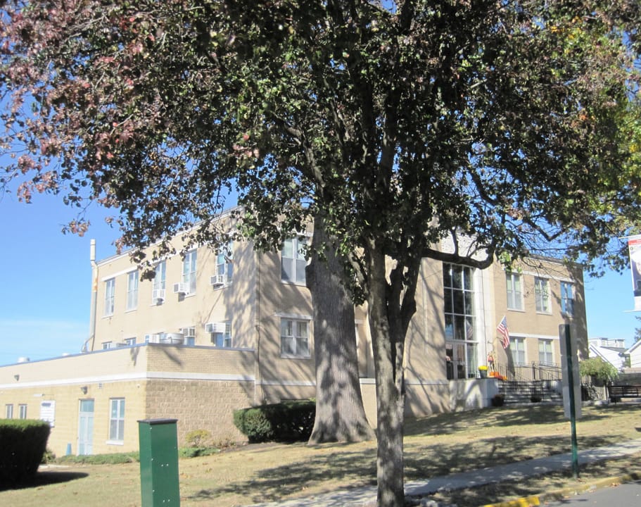Photo of the Carlstadt Memorial Municipal Building in Carlstadt, New Jersey. Photo taken from Madison Street looking north.
