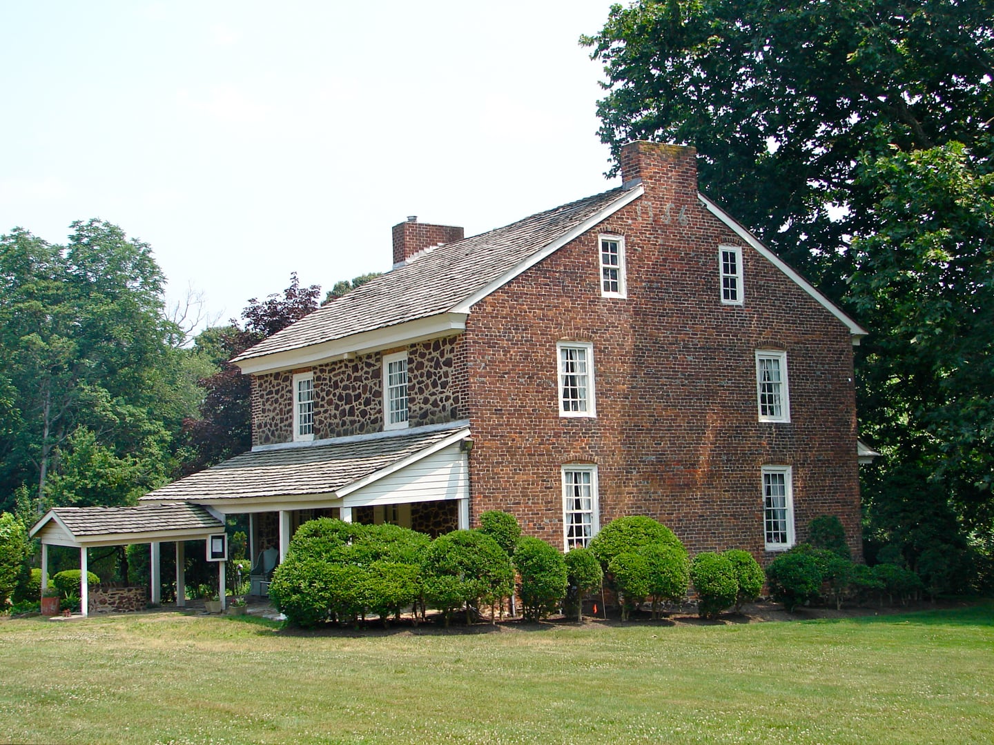 Brick exterior of the 1756 Gabreil Daveis Tavern (Hillman Hospital House) at 500 3rd Avenue in Glendora, Gloucester Township, New Jersey.