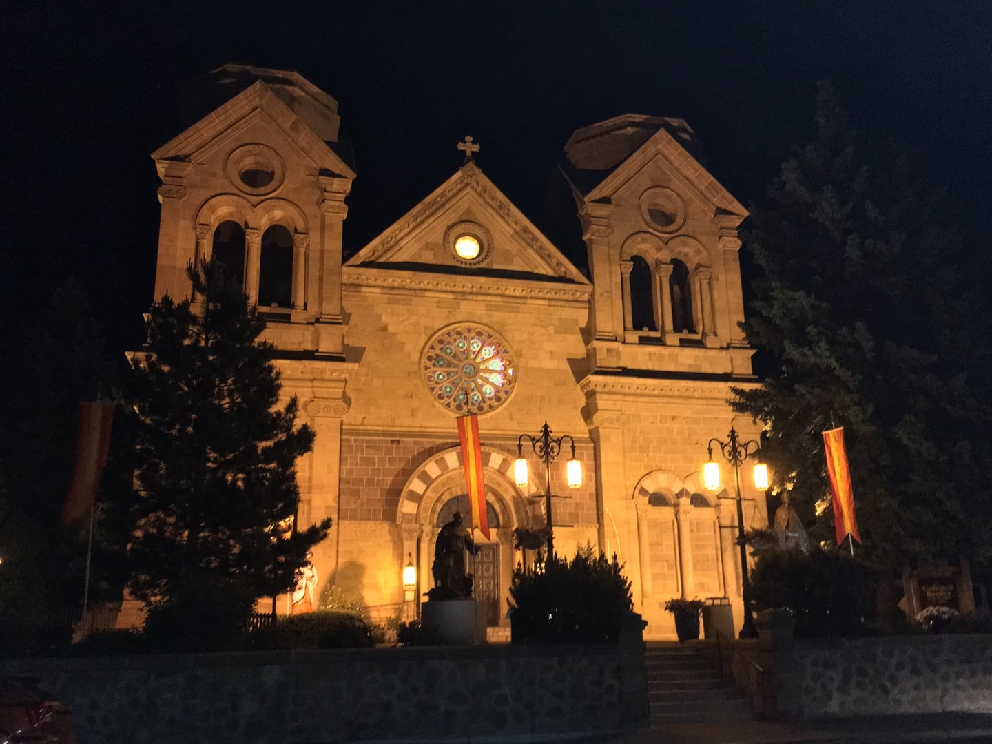 Stone facade and twin towers of the Cathedral Basilica of St. Francis of Assisi in Santa Fe, New Mexico