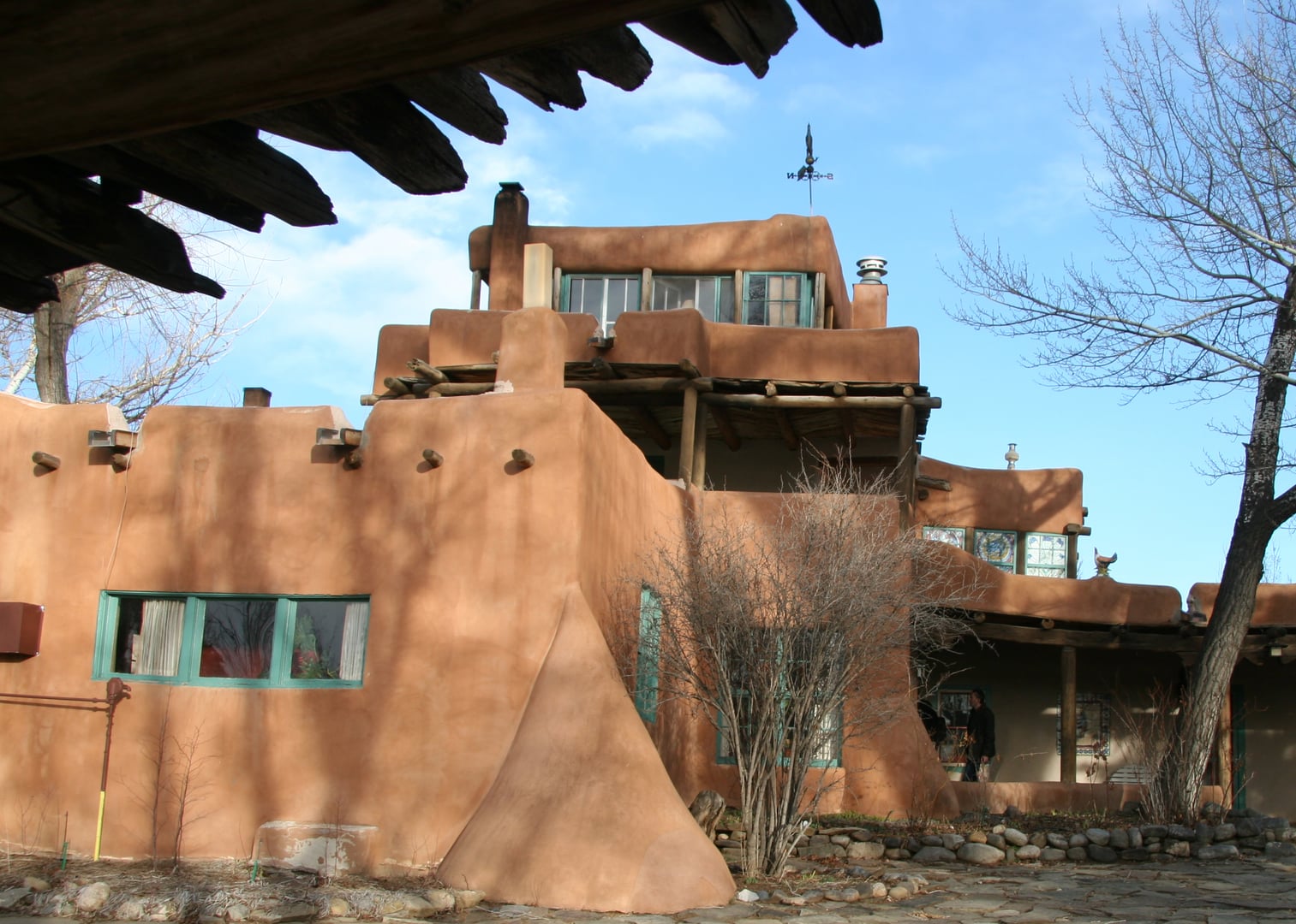 Pueblo Revival adobe exterior of the Mabel Dodge Luhan House in Taos, New Mexico