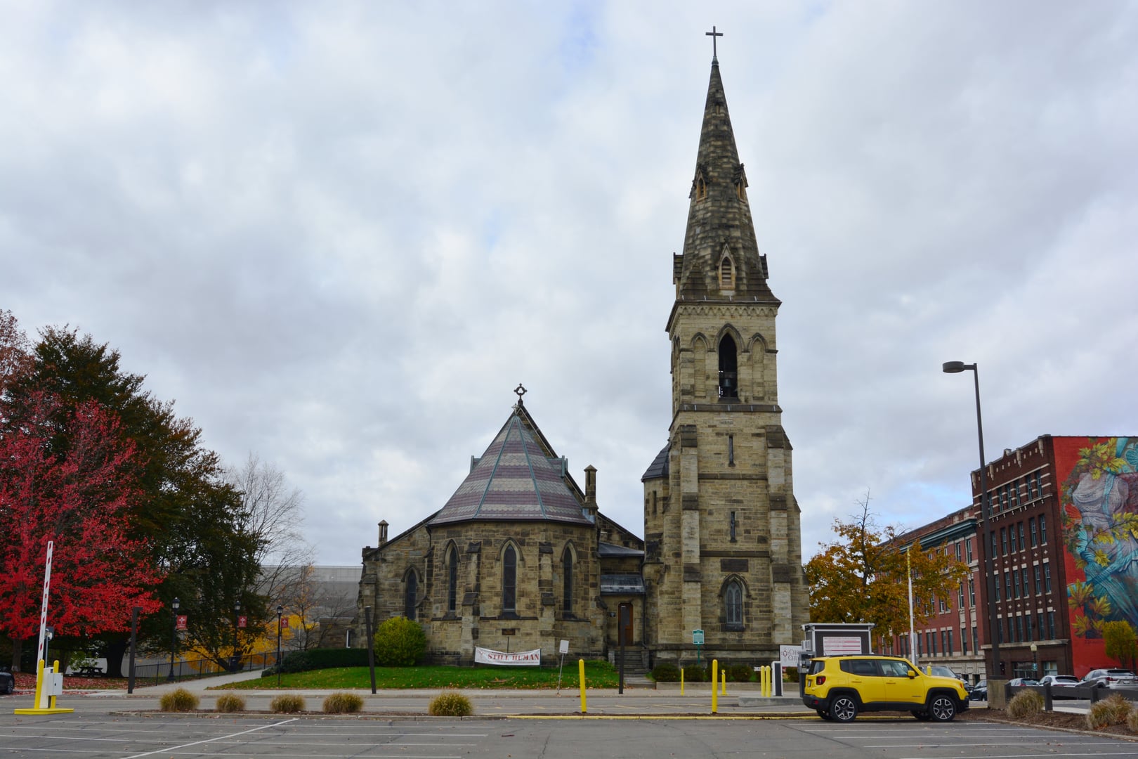 Gothic Revival stone exterior and steeple of Christ Episcopal Church in downtown Binghamton, New York