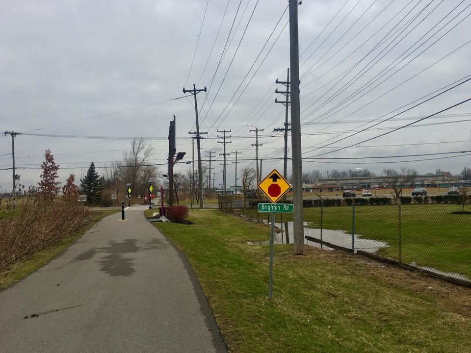 Signage along the Tonawanda Rail Trail near its intersection with Brighton Road, Tonawanda, New York, 13th January 2020.