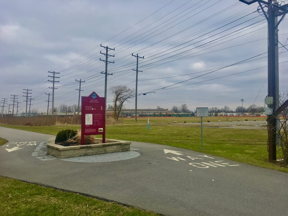 Signage along the Tonawanda Rail Trail loking north from just past the Brighton Road access point, Tonawanda, New York, 15th January 2020.