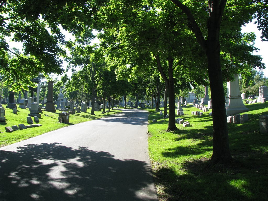 Mausoleums and mature trees at Forest Lawn Cemetery on Delaware Avenue in Buffalo, New York