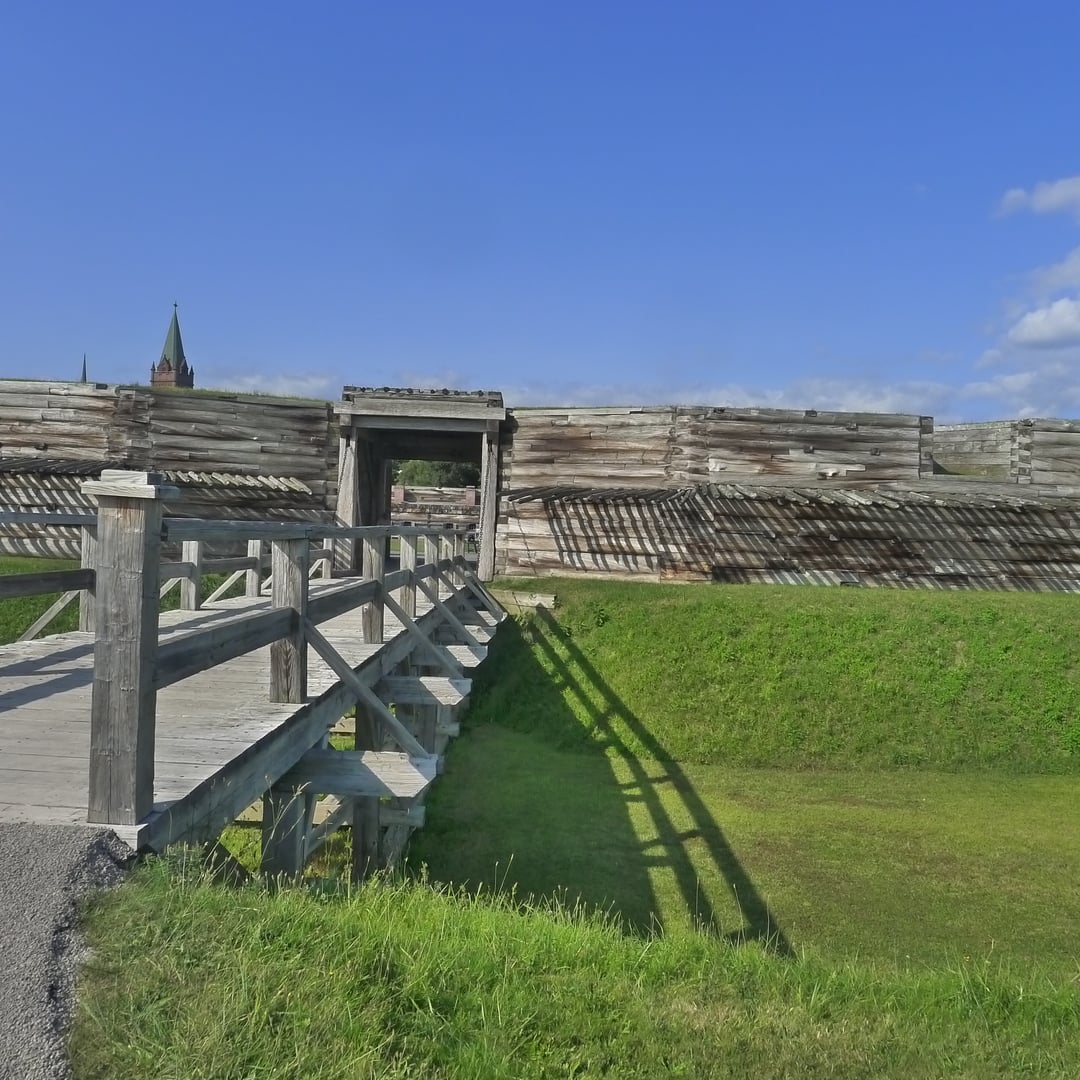 Entrance drawbridge and reconstructed timber walls of Fort Stanwix National Monument in downtown Rome, New York.