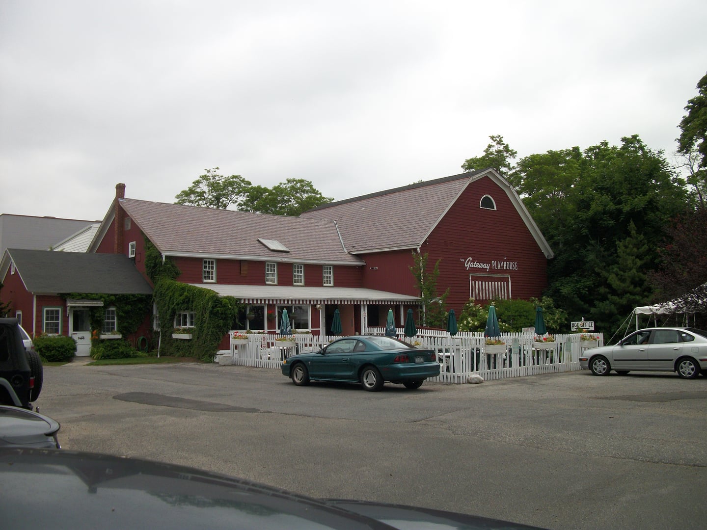 The Gateway Playhouse building as seen from the parking lot exit in Bellport, New York