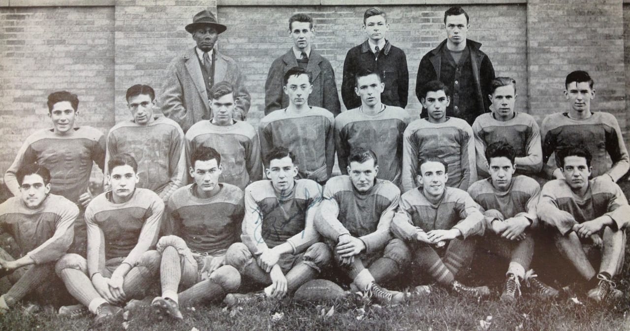 DeSales High School, Geneva, NY's head football coach and his team from Fall 1940. The image comes from the 1941 Salesian, the school's yearbook.