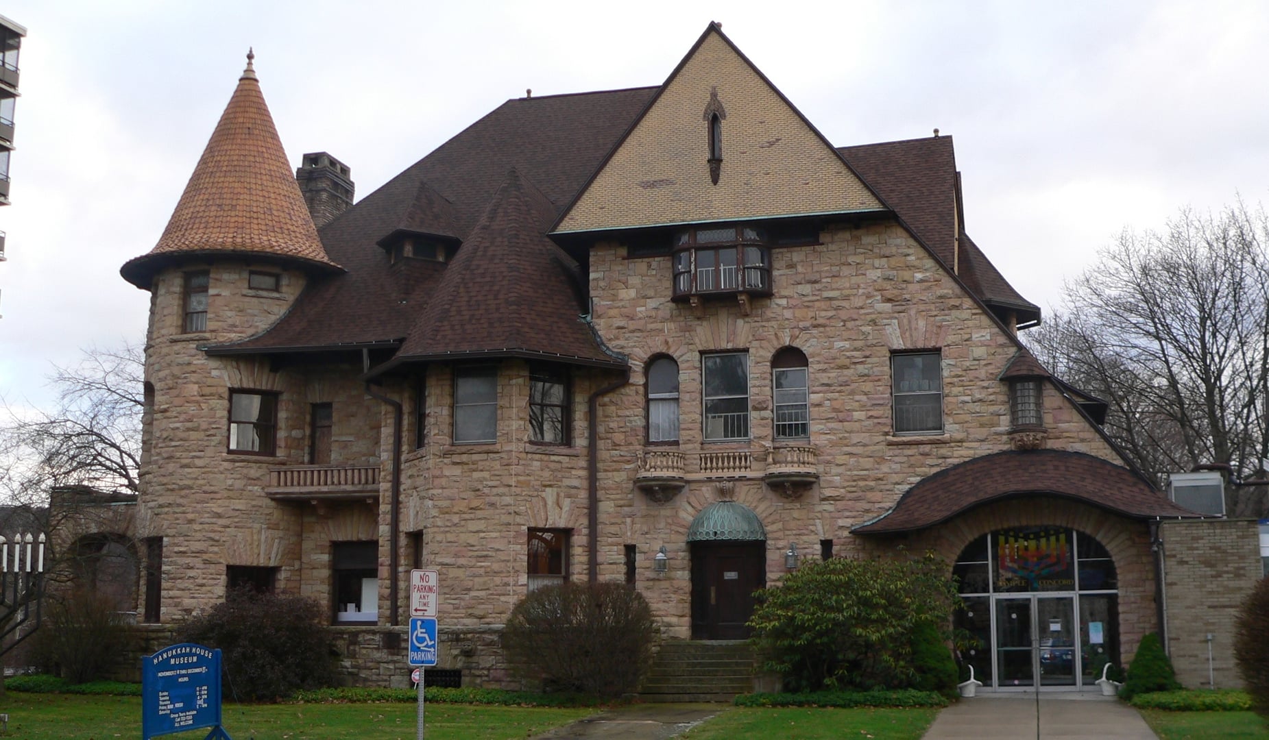 Exterior of the Jonas M. Kilmer House at 9 Riverside Drive, Binghamton, showing Victorian stone turrets and towers