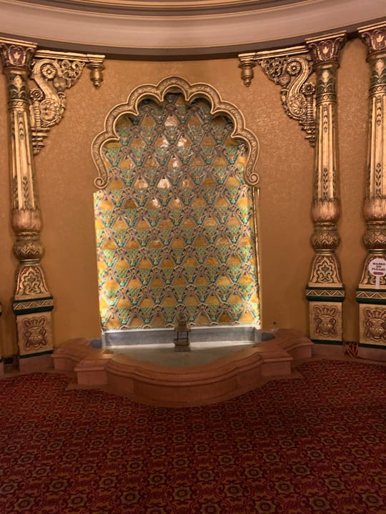 An ornate gilded Indo-Persian alcove inside the Landmark Theatre's auditorium, Syracuse, New York.