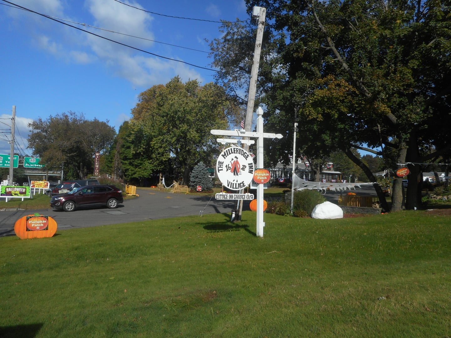 The historic Milleridge Inn sign at the entrance in Jericho, New York