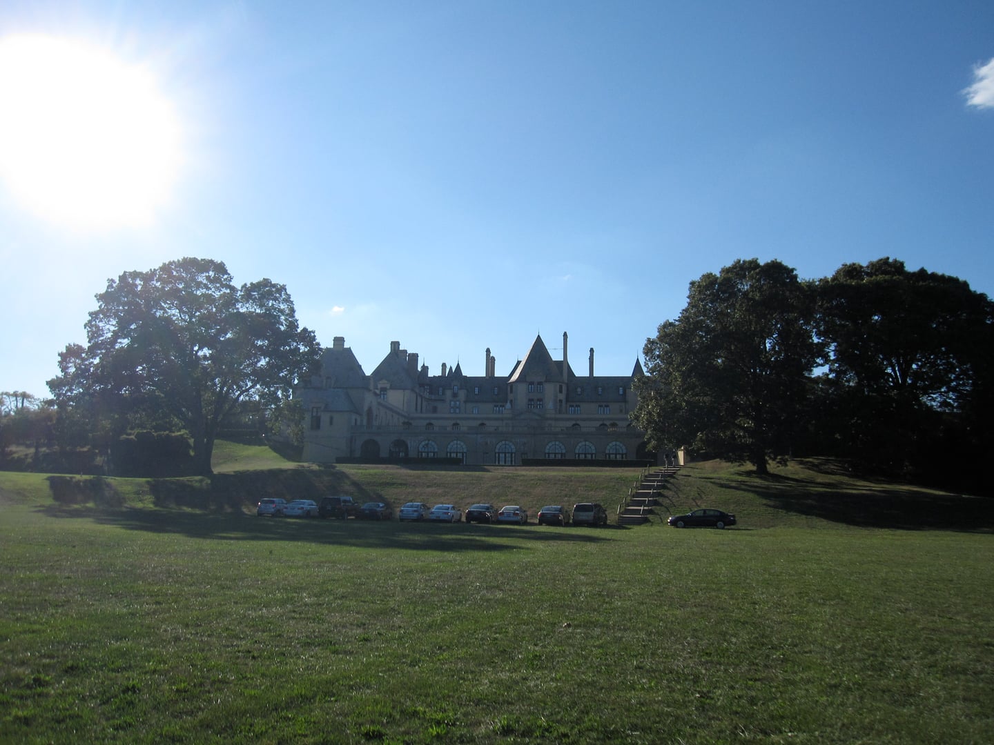 Oheka Castle seen from the eastern side, showing the French chateau architecture and formal grounds